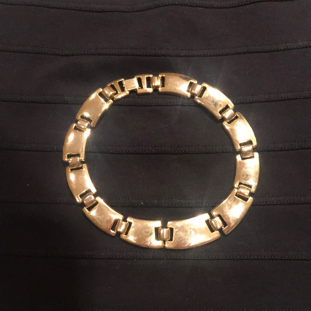 Gold tone choker necklace